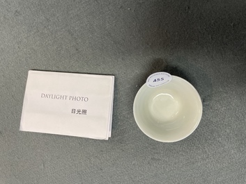 A Chinese blue and white inscribed wine cup, Kangxi