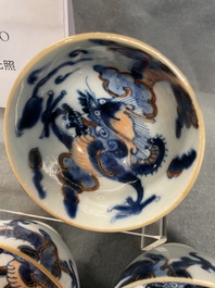 Six Chinese doucai 'dragon' cups and saucers, Kangxi