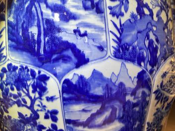 A massive Chinese blue and white vase with floral and landscape panels, Kangxi