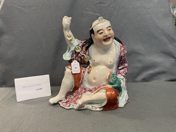 A Chinese famille rose figure of Liu Hai with the toad, seal mark, Republic