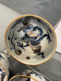 Six Chinese doucai 'dragon' cups and saucers, Kangxi