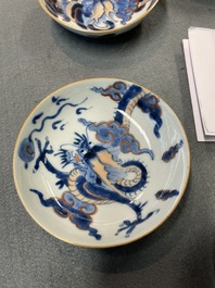 Six Chinese doucai 'dragon' cups and saucers, Kangxi