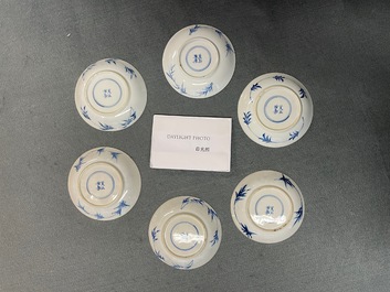 Six Chinese blue and white cups and saucers with horseriders, Kangxi