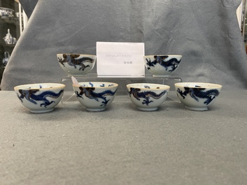 Six Chinese doucai 'dragon' cups and saucers, Kangxi