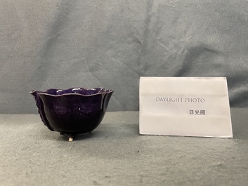 A Chinese aubergine- and turquoise-glazed 'lotus' trick cup, Kangxi