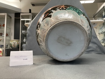 A Chinese famille noire 'dragon' bottle vase, 19th C.