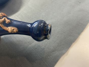 A Chinese monochrome blue garlic head vase with applied biscuit dragon, Jiajing