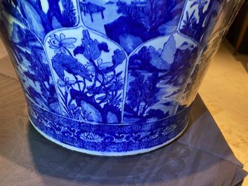 A massive Chinese blue and white vase with floral and landscape panels, Kangxi