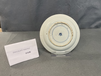 A Chinese blue and white plate with a junk, Wanli
