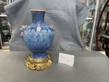 A Chinese gilt bronze-mounted flamb&eacute;-glazed vase, 18/19th C.