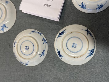 Six Chinese blue and white cups and saucers with horseriders, Kangxi