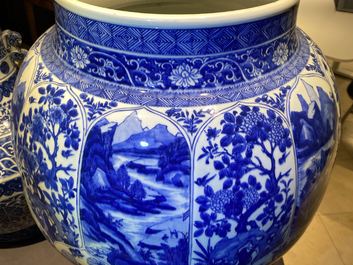 A massive Chinese blue and white vase with floral and landscape panels, Kangxi