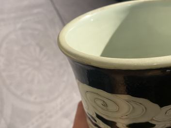 A Chinese famille noire 'dragon' bottle vase, 19th C.