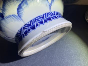A pair of Chinese blue and white 'hunting scene' jars and covers, Kangxi