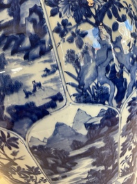 A massive Chinese blue and white vase with floral and landscape panels, Kangxi