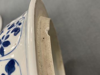 A pair of Chinese blue and white 'hunting scene' jars and covers, Kangxi