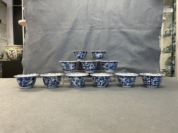 Eleven Chinese blue and white lobed cups and saucers, Kangxi