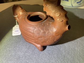 A Chinese Yixing 'phoenix' stoneware teapot and cover, Kangxi