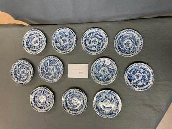 Eleven Chinese blue and white lobed cups and saucers, Kangxi