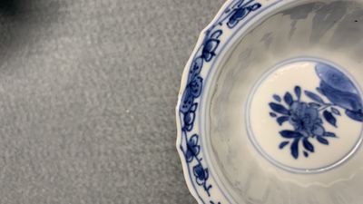 Eleven Chinese blue and white lobed cups and saucers, Kangxi