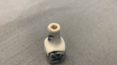 Fifteen Chinese mostly blue and white miniature vases, Kangxi
