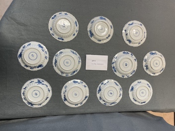 Eleven Chinese blue and white lobed cups and saucers, Kangxi
