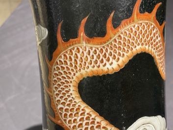 A Chinese famille noire 'dragon' bottle vase, 19th C.