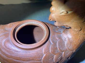 A Chinese Yixing 'phoenix' stoneware teapot and cover, Kangxi