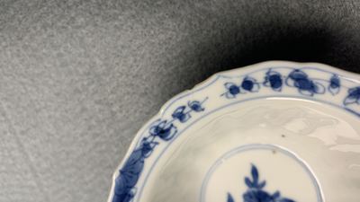 Eleven Chinese blue and white lobed cups and saucers, Kangxi
