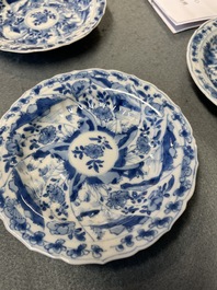 Eleven Chinese blue and white lobed cups and saucers, Kangxi