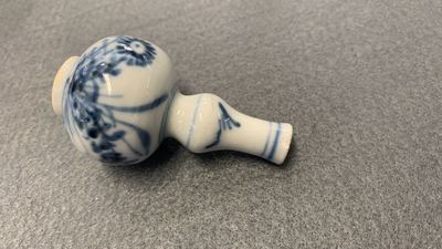 Fifteen Chinese mostly blue and white miniature vases, Kangxi