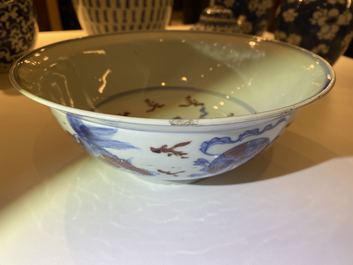 A Chinese blue, white and copper red bowl with Buddhist lions, Qianlong mark, 19th C.
