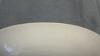 Seventeen Chinese famille rose cups and nineteen saucers, Qianlong