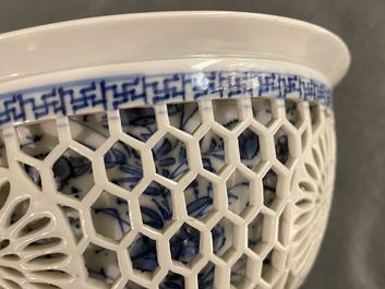 A Chinese blue and white reticulated double-walled bowl, Kangxi