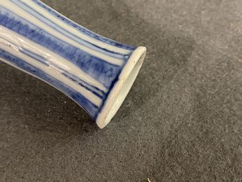 A Chinese blue and white double gourd vase with floral design, Wanli