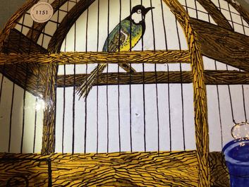 Een polychrome Delftse 'vogelkooi' plaquette, gedateerd 1773
