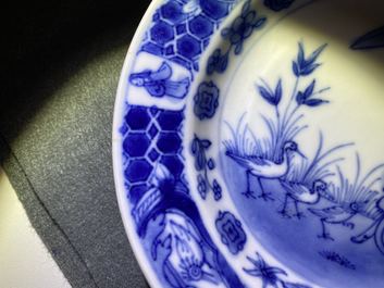 Three Chinese blue and white 'Dames au parasol' plates after Pronk, Qianlong