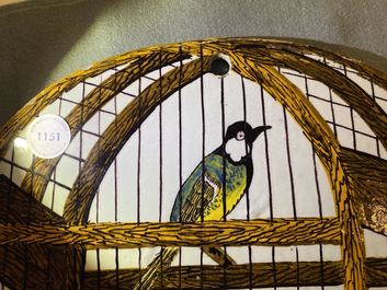 Een polychrome Delftse 'vogelkooi' plaquette, gedateerd 1773