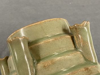 A Chinese Longquan celadon five-spouted urn, Song