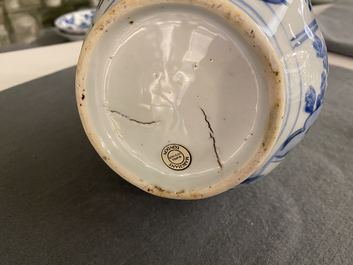 A Chinese blue and white double gourd vase with floral design, Wanli