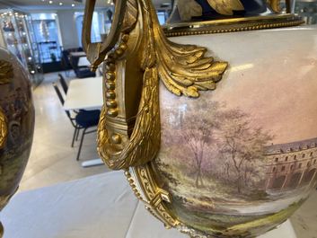 A pair of massive French S&egrave;vres-style vases with gilt bronze mounts, signed Desprez, 19th C.