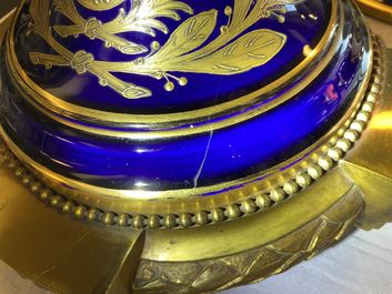 A pair of massive French S&egrave;vres-style vases with gilt bronze mounts, signed Desprez, 19th C.
