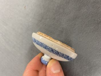 A Chinese blue and white teapot and cover with antiquities, Jiajing mark, Kangxi