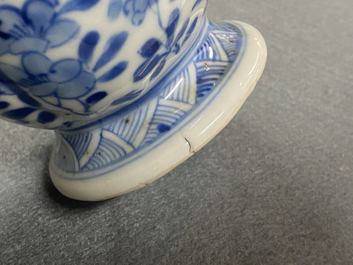 A Chinese blue and white two-spouted oil and vinegar bottle, Kangxi