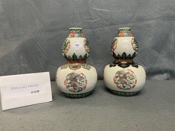 A pair of Chinese famille verte double gourd 'dragon' vases, 19th C.