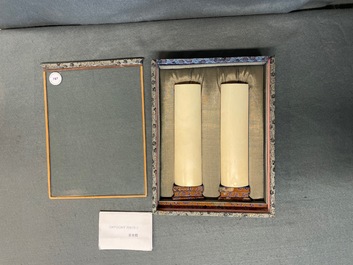 A pair of Chinese polychrome carved wrist rests in presentation box, Republic