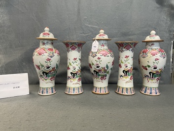 A Chinese famille rose garniture of five vases with antiquities, Qianlong