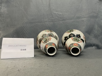 A pair of Chinese famille verte double gourd 'dragon' vases, 19th C.