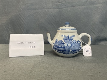 A Chinese blue and white teapot and cover with antiquities, Jiajing mark, Kangxi