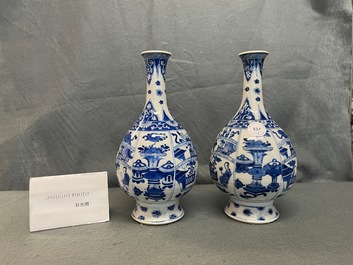 A pair of Chinese blue and white bottle vases, Kangxi